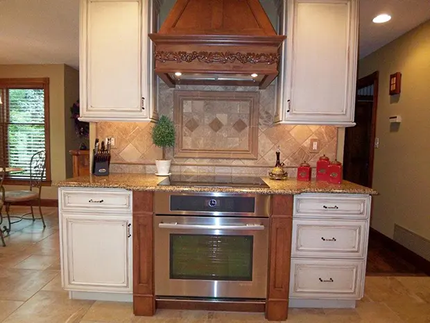 granite kitchen countertops with elegant tile backsplash